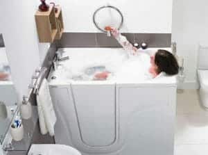 Woman enjoying her bath in a step in bathtub